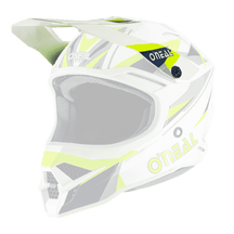 Der O’NEAL Visor 3SRS Helmet TRIZ ist ein auffälliger Motocross-Helm in Weiß und Neongelb mit schwarzen Akzenten, der den Markennamen „O’NEAL“ seitlich und vorne prominent zur Schau stellt. Er verfügt über ein Belüftungssystem, ein schlankes aerodynamisches Design, ein Visier und einen integrierten Mundschutz.