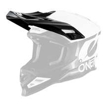 Abgebildet ist ein O'NEAL Visor F-SRS Helm 2T, ein Integralhelm für Motocross mit schwarz-weißen Grafiken. Das elegante Design umfasst ein Visier und Belüftungsöffnungen in Kinn- und Stirnnähe, wobei der Markenname „O'NEAL“ prominent auf der Seite aufgedruckt ist. Fans von Motorradbekleidung werden den anspruchsvollen Look zu schätzen wissen.