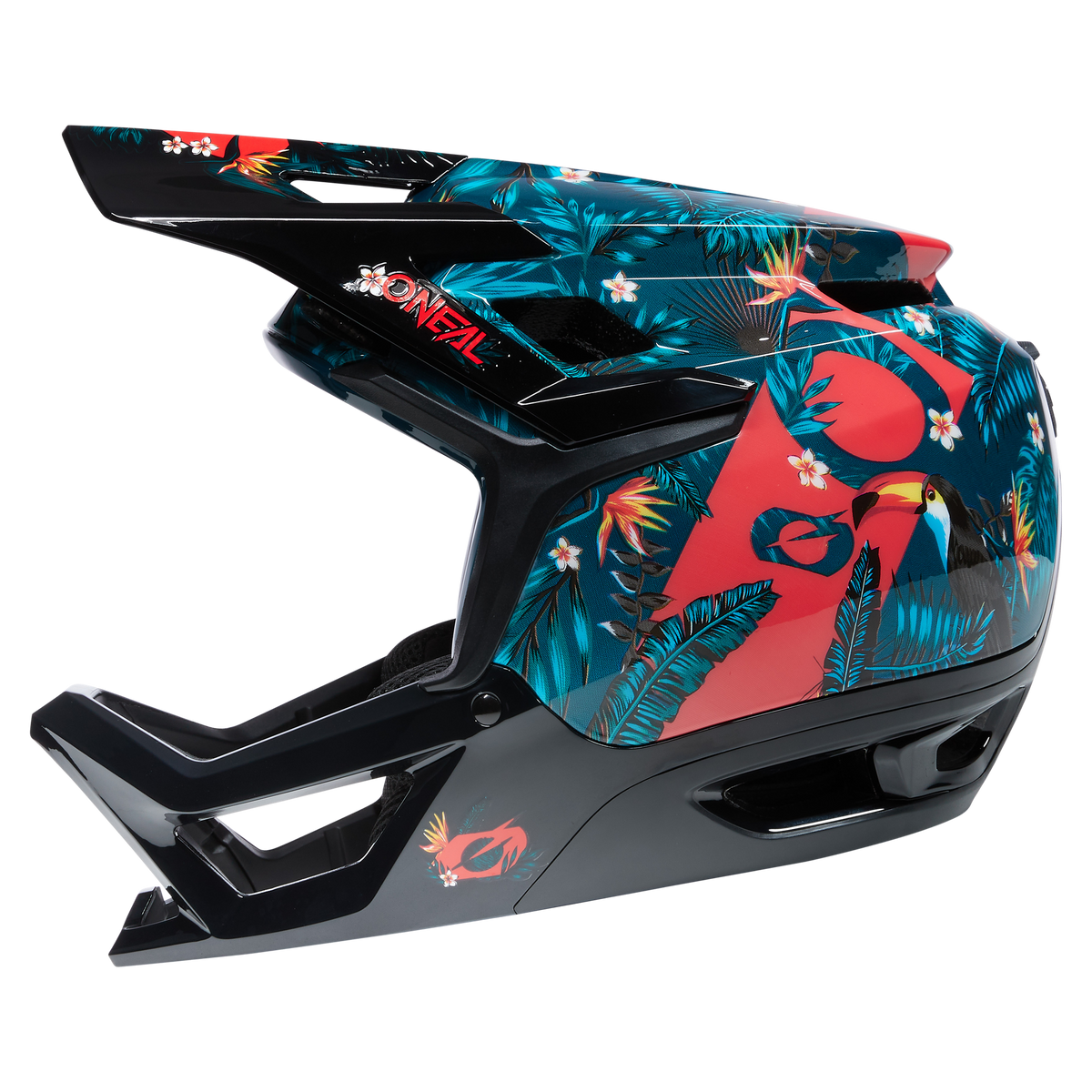 Ein O'NEAL TRANSITION TwiceMe Helm RIO in Schwarz und Blaugrün mit einem auffälligen, farbenfrohen Design mit tropischen Elementen wie Flamingos, Tukanen und Laub. Der Helm enthält außerdem Akzente aus roten und weißen Blumen, die dem Dschungelthema insgesamt eine lebendige Note verleihen.