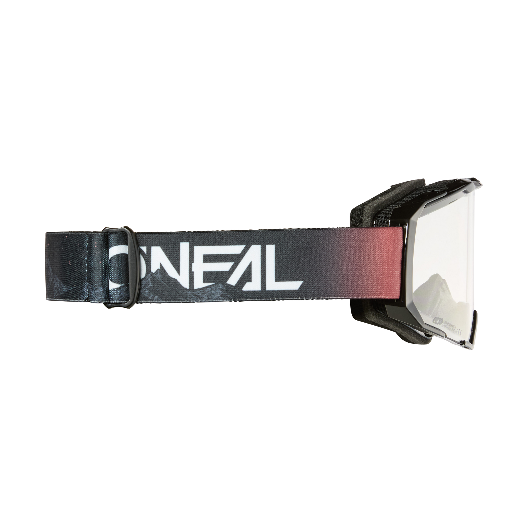 Seitenansicht der O'NEAL B-22 Goggle COVERT, einer Motocross-Brille mit getöntem Band und dem Markennamen „O'NEAL“ in Weiß. Diese Brille hat eine klare Linse und einen schwarzen Rahmen und ist für Offroad-Biken und Motorsport konzipiert.