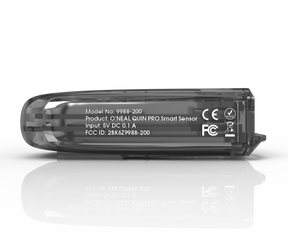 Transparentes elektronisches Gerät mit Innenteilen, gekennzeichnet als Modell 9988-200. Es handelt sich um den O'NEAL QUIN PRO Smart Sensor mit einem Eingang von 5 V DC 0,1 A und der FCC-ID 2BK62-9988-200.