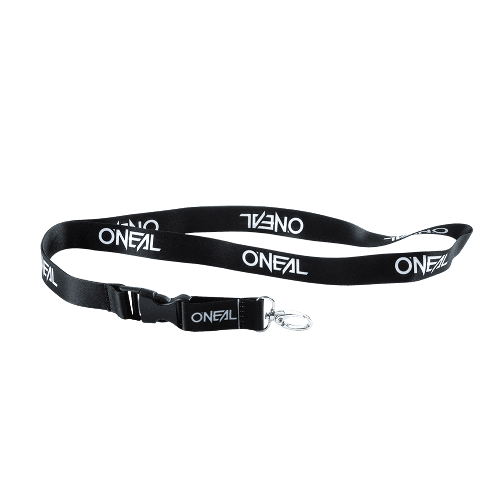 Das O'NEAL Lanyard der Marke O'NEAL ist schwarz mit dem Text „ONEAL“ in mehreren weißen Aufdrucken. Es verfügt über einen Schlüsselring aus Metall und einen Clip aus Kunststoff. Der Hintergrund ist schlicht und transparent.